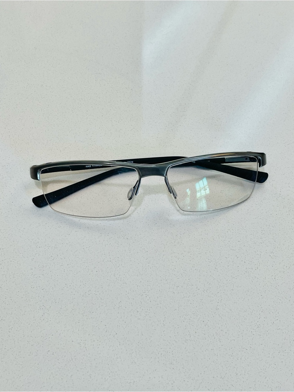 Nike Eyeglasses Frames (prescription) 6052
Brushed Grey Half Rim Titanium